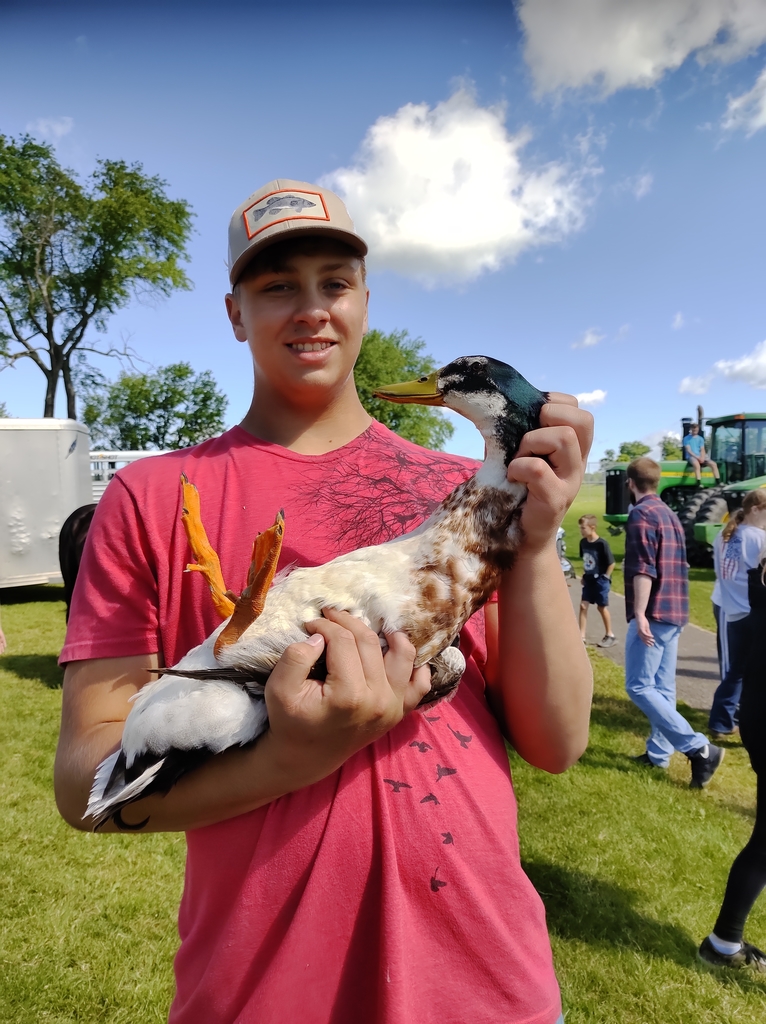 Student holding a duck